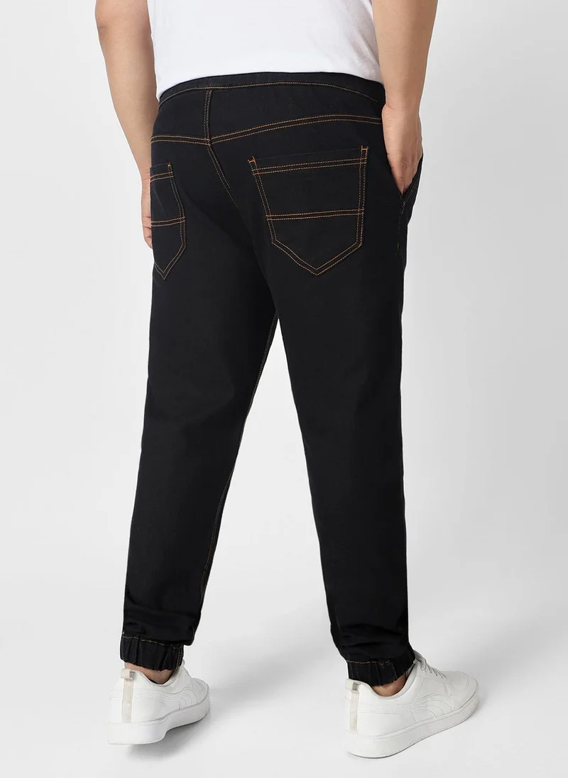 Urbano Fashion  Urbano Plus Men's Jet Black Regular Fit Washed Jogger Jeans Stretchable for Men | Best Price UAE